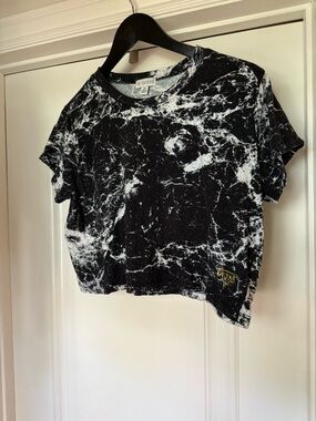 Guess Black & White Marble Logo Cropped Tee with Gold Accent